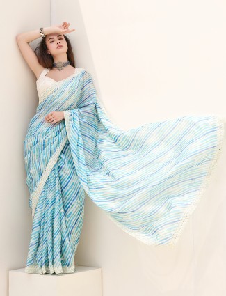 Fabulous blue printed tissue silk saree