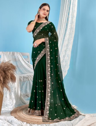 Dark green georgette saree for festive