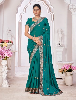 Teal green embroidery georgette saree