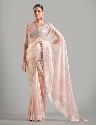 Elegant light pink tissue silk saree