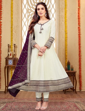 Gorgeous off-white and purple suit for festive