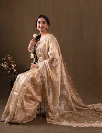 Modern wedding style golden tissue silk saree