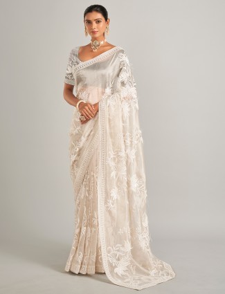 Elegant off white silk saree with unstitched blouse