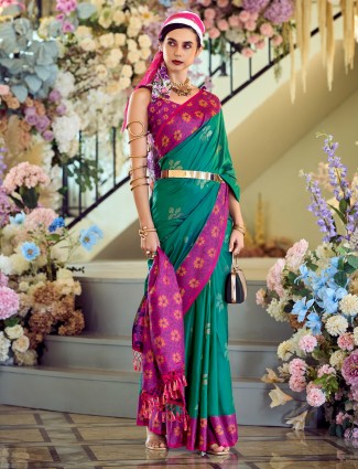 Printed green saree in soft silk fabric with zari work