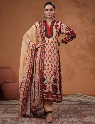 Peach printed silk kurti set featuring sequins and beads work