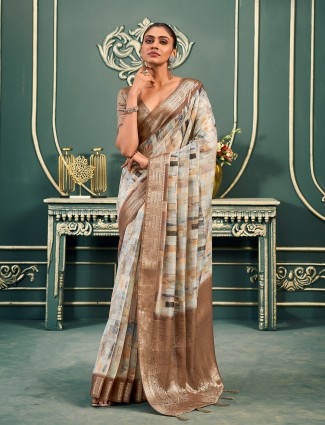 Pretty cotton brown printed saree