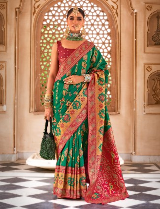 Dark green patola silk saree