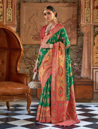 Dark green patola silk saree