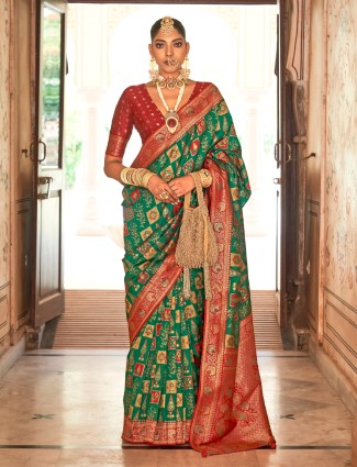 Dark green wedding wear patola silk saree