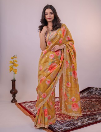 Mustard yellow floral printed tissue silk saree