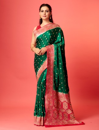 Trendy dark green silk zari saree