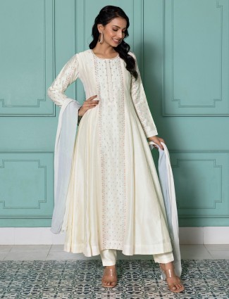 Stunning off-white silk salwar suit with dupatta