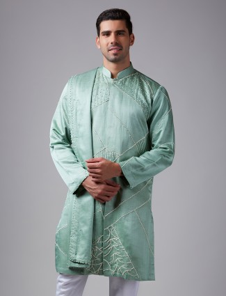 Stunning sea green silk kurta suit