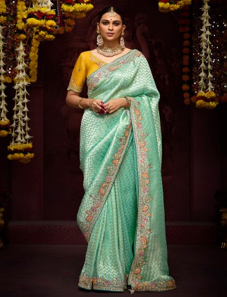 Stunning light green zari weaving saree
