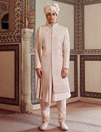Peach raw silk peshwai style sherwani with fine embroidery