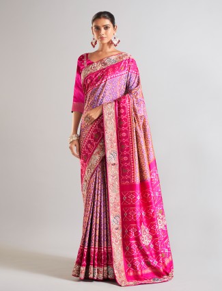 Trendy Rani color patola silk wedding look saree