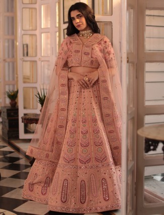 Trendy peach lehenga choli in raw silk