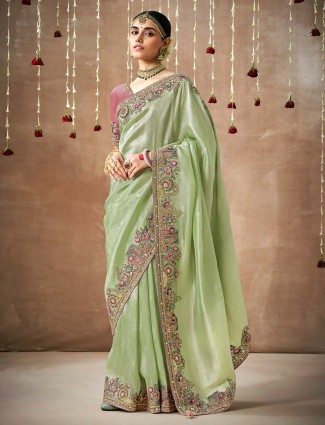 Classic pista green dola silk saree for festive