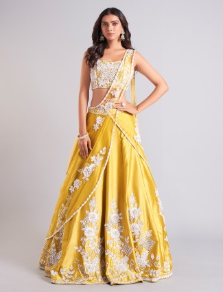 Mustard yellow silk lehenga choli with attetched dupatta