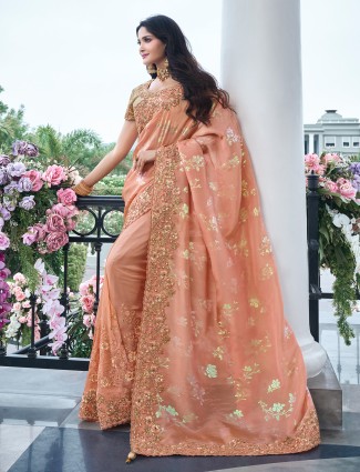 Stunning peach tissue silk saree