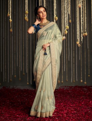 Classy light green tissue silk saree