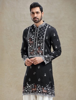 Black kurta salwar set in unique embroidery pattern