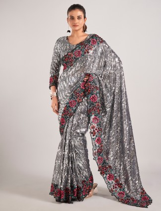Stunning black net with sequins saree