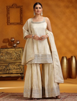 Cream silk sharara suit for wedding wear