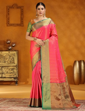 Bright pink silk saree with intricate zari work