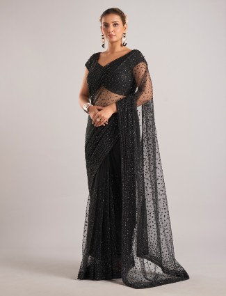 Black net party wear saree with cutdana work