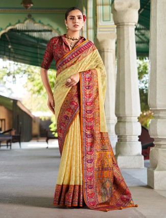 Beige printed georgette saree enhanced with thread embroidery