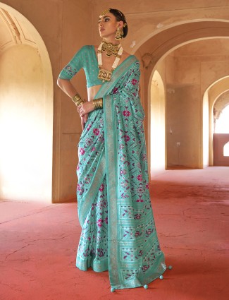 Mint blue patola silk saree with printed detailing