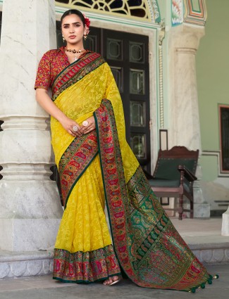 Yellow georgette saree adorned with thread work