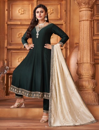 Dark green silk salwar suit with contrast dupatta