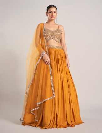 Mustard yellow silk lehenga choli for haldi