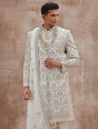 White art silk groom sherwani paired with dupatta