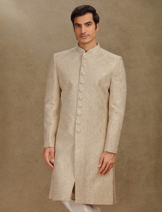 Gold silk sherwani with diamond detailing