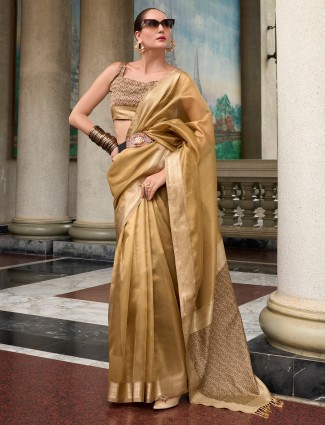 Pastel beige tissue silk zari weaving saree for festivals