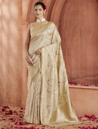 Wedding style cream zari weaving saree