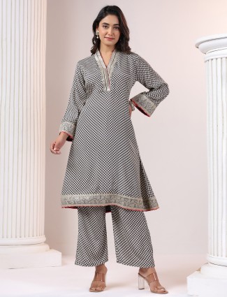 Black printed silk kurti suit with sequins embellishment