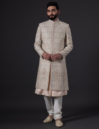 Peach silk wedding sherwani for groom