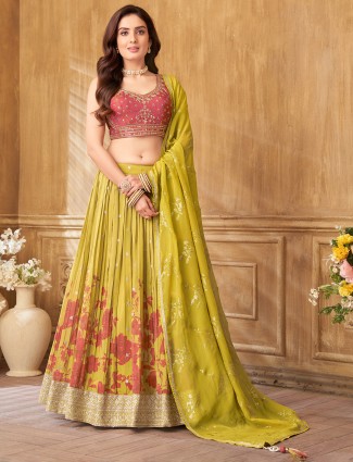 Mehendi yellow silk lehenga choli with intricate prints