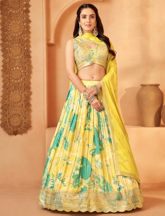 Yellow silk lehenga choli with printed designs