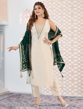 Beige and green silk salwar suit with mirror embellishment