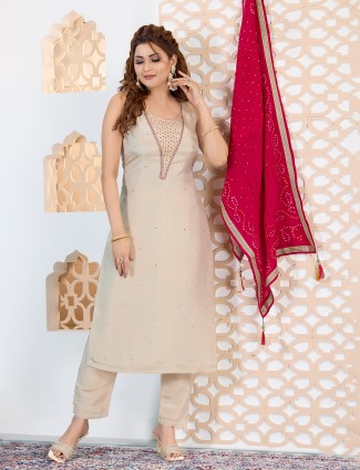 Beige silk straight cut sleeveless salwar suit