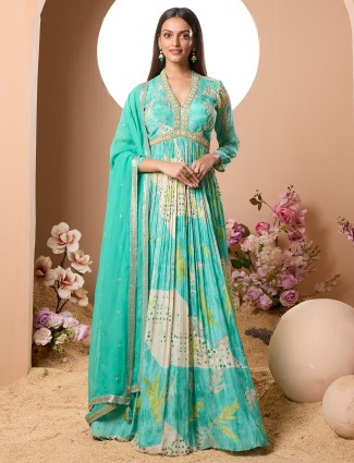 Women anarkali-style salwar suit in an aqua tint