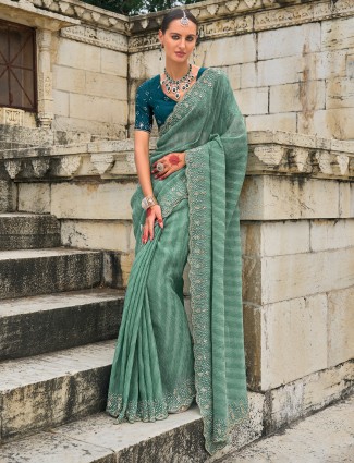 Tissue silk sea green saree