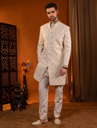 Cream sherwani in silk for the groom