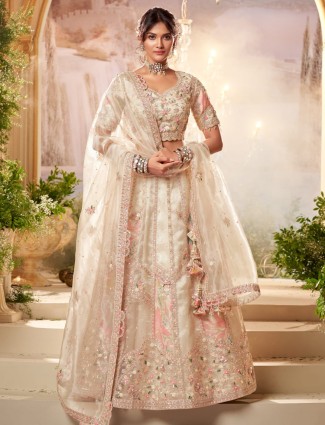 Cream bridal style unstitched lehenga choli with sequins embellishment