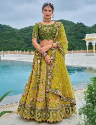 Attractive mehendi green silk lehenga choli